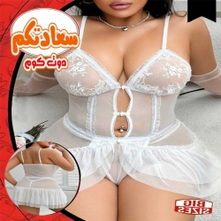 قطعة لانجيري دانتيل أبيض عالي الجودة، مصممة بتفاصيل بيبي دول التي تضيف لمسة من الرقي والجمال للجسم الممتلئ.